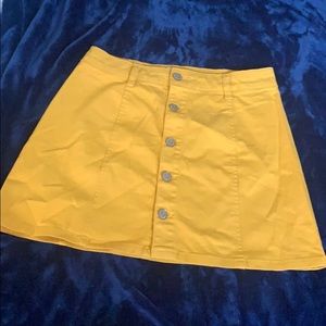 Celebrity in Pink yellow mini skirt